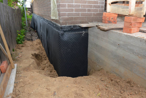 Happy homeowners after waterproofing job in Angola